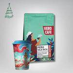 Dovanų rinkinys: Daugkartinis puodelis su A. Kriščiūno kūryba 473 ml ir kava 200 g VERO CAFE Peru Vila Rica 200 g 