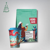 Dovanų rinkinys: Daugkartinis puodelis su A. Kriščiūno kūryba 473 ml ir kava 200 g VERO CAFE Peru Vila Rica 200 g 