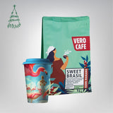 Dovanų rinkinys: Daugkartinis puodelis su A. Kriščiūno kūryba 473 ml ir kava 200 g VERO CAFE Sweet Brasil 200 g 
