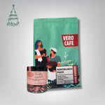 Dovanų rinkinys: RŪTA drąžė 120 g ir kava 200 g VERO CAFE Traškūs migdolai su Ruby šokoladu ir juodaisiais serbentais 120g Columbia Monteblanco Peach 200 g Malta