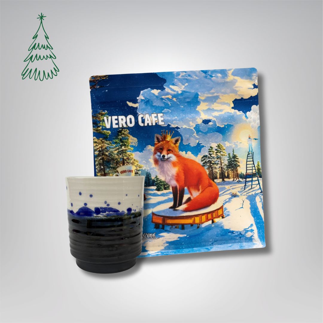 Dovanų rinkinys: R. Dagio keramikinis puodelis ir kava 200 g VERO CAFE Mėlynas ~400 ml Lapė 200 g Pupelės