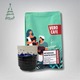 Dovanų rinkinys: R. Dagio keramikinis puodelis ir kava 200 g VERO CAFE Mėlynas ~400 ml Nicaragua Montecristo 200 g 