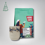 Dovanų rinkinys: R. Dagio keramikinis puodelis ir kava 200 g VERO CAFE Baltas ~400 ml Peru Vila Rica 200 g 